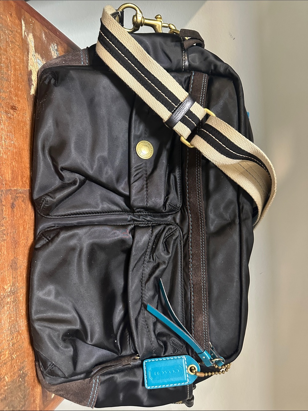 Coach Black Nylon Baby Bag with Beige-Striped Strap and Turquoise Tag